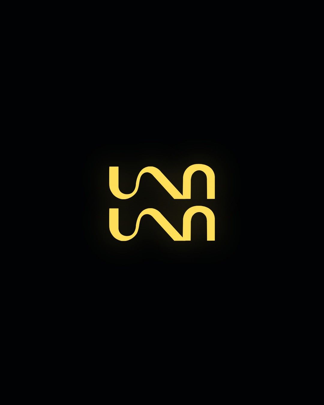 UAN MEDIA logo, yellow on black
